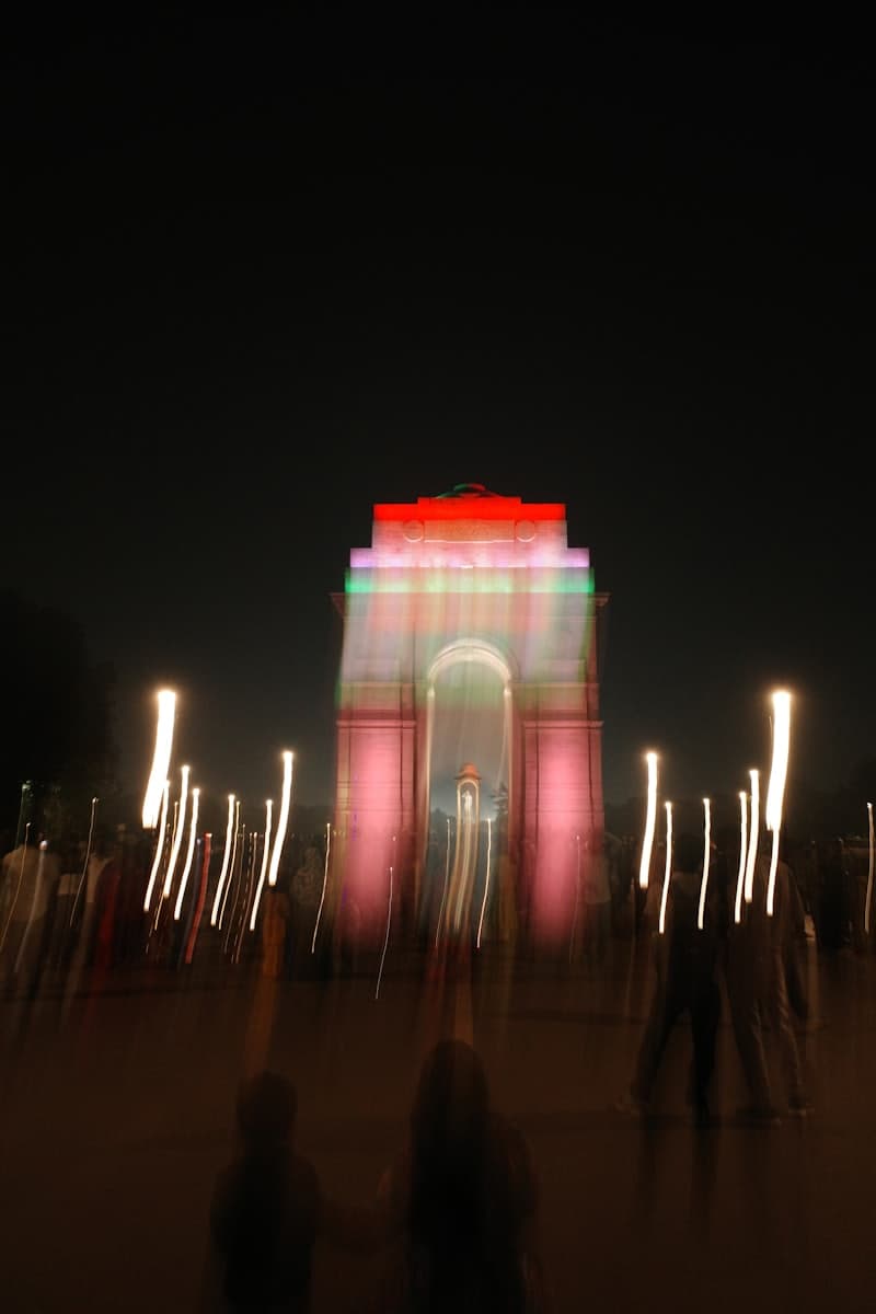 India Gate illuminated at night in Delhi
